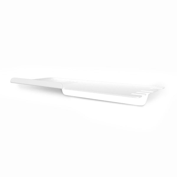 A FOLD Shower Shelf ∙ White toothbrush holder on a white surface.