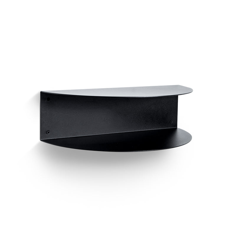 A FOLD Bedside Table ∙ Black by Made of Tomorrow, hanging on a white wall, perfect for small spaces.