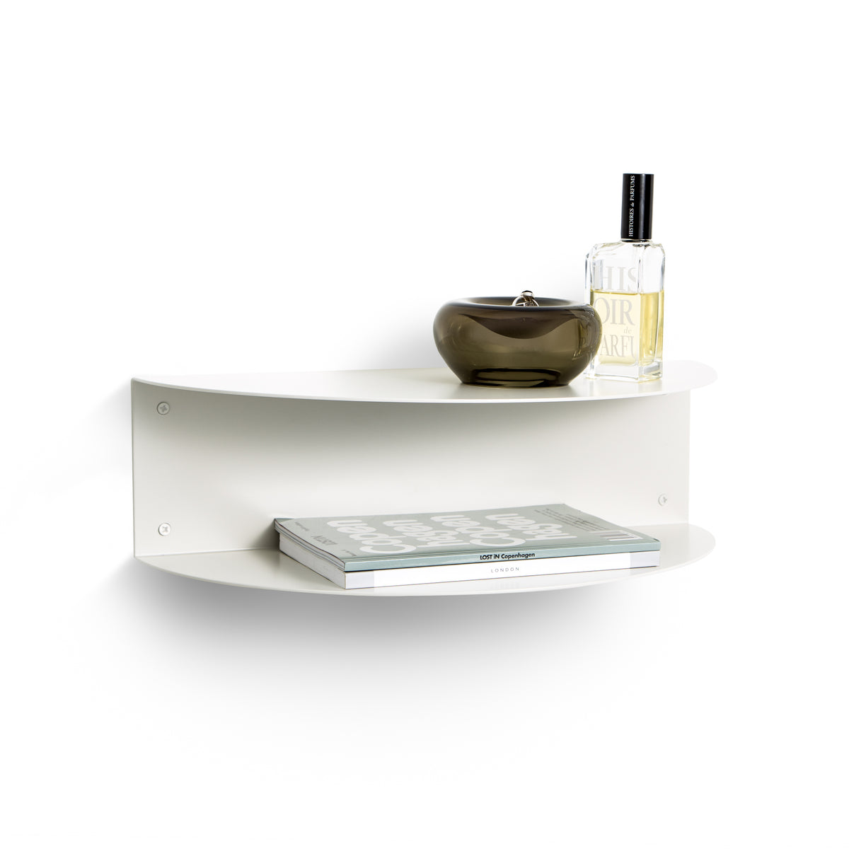FOLD Bedside Table in white by Made of Tomorrow, wall-mounted shelf styled with a perfume bottle