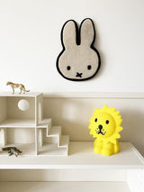 A child's room with a Maison Deux WALL RUG MIFFY WHITE.