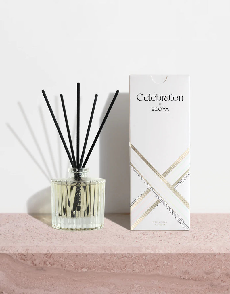 A stylish Nordic-inspired gift box featuring the Ecoya Celebration | White Musk & Warm Vanilla Fragranced Diffuser, displayed against a soft pink backdrop.