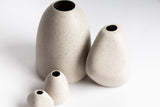 Three HARMIE Pebble Vase - Natural, hand-crafted feel vases on a white surface by Ned Collections.