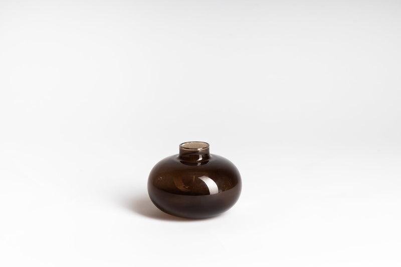 A small brown Ned Collections Donny Vase on a white background.