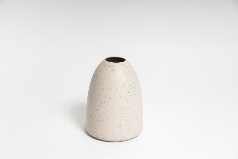 A small white HARMIE Pebble Vase - Natural on a white background, hand-crafted by Vietnamese Artisans.