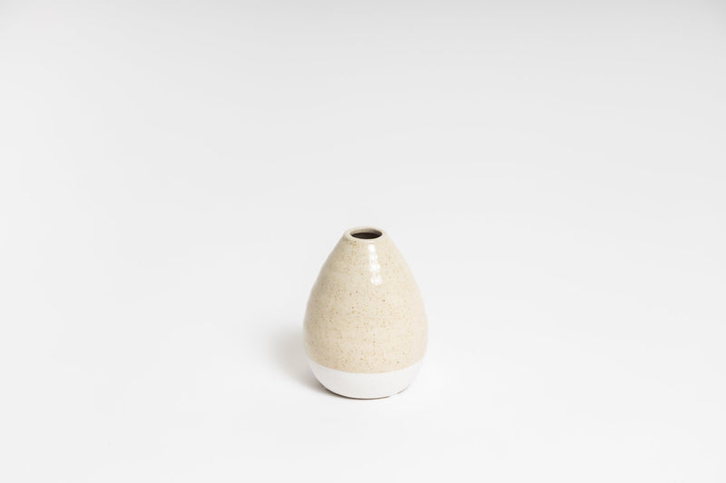 A small beige CHARLIE VASE from the Ned Collections.