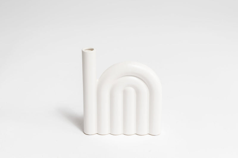 The HAROLD VASE from the Ned Collections range is a white vase with a curved shape.