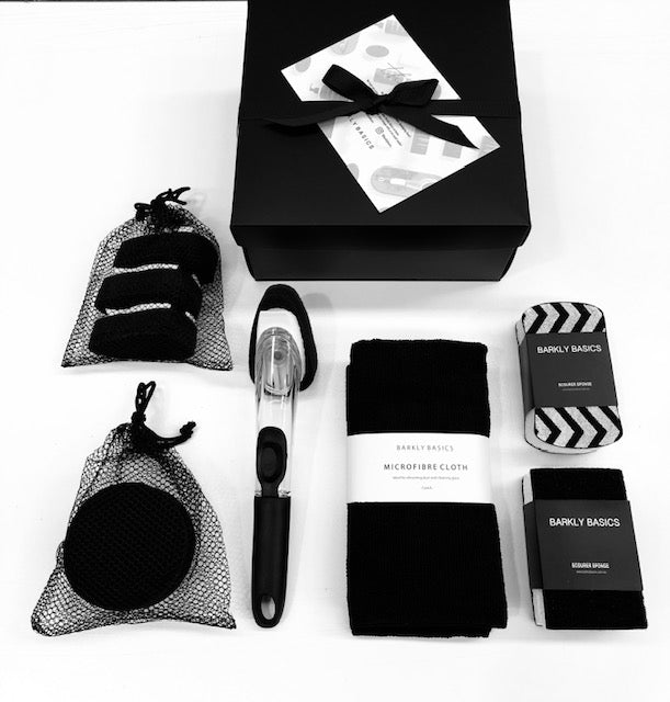 Barkly Basics new home gift box holding cloths, a brush and cleaning bottles