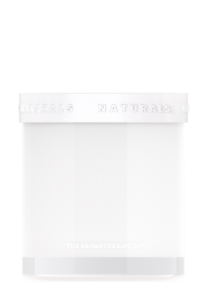 Naturals soy candle in a frosted white glass jar with its white lid on