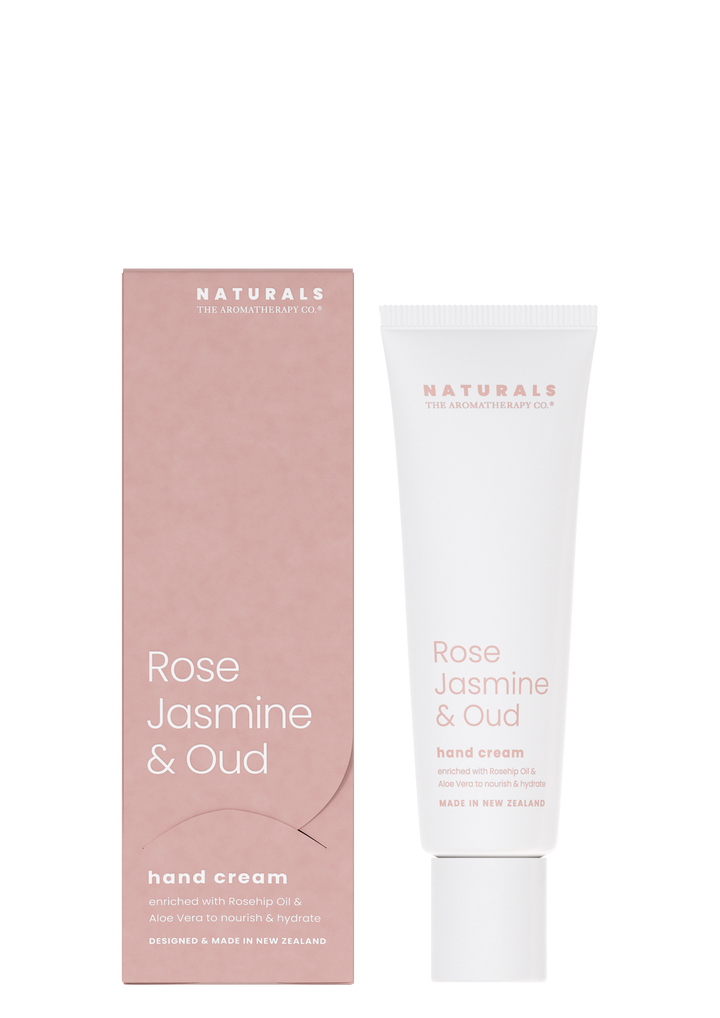 Naturals Rose Jasmine & Oud hand cream tube beside its dusty pink box