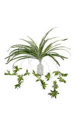 A green Spider Plant 64cm by Artificial Flora sits in a vase on a white background.