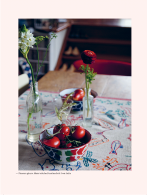 Home book page spread showing a table with tomatoes