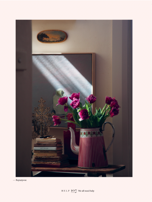 Home book page spread showing pink tulips on a table