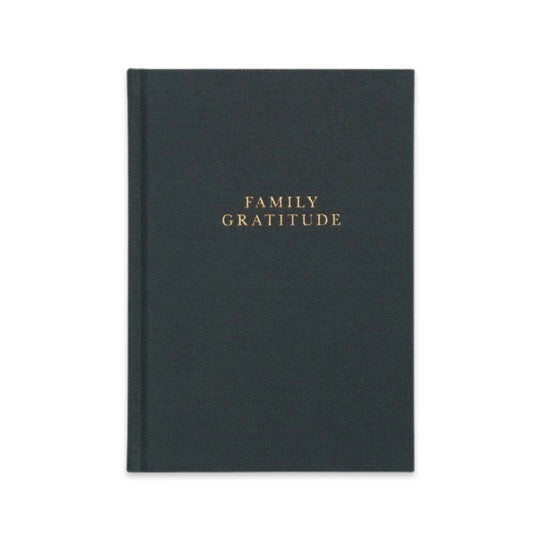 A black Write To Me FAMILY GRATITUDE JOURNAL | STONE, meant to teach about living in gratitude and practicing daily acts of kindness for a grateful life.