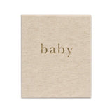 A beige Baby - THE FIRST YEAR OF YOU - Boxed Baby Journal diary with the word Write To Me on it, perfect for a baby shower gift.