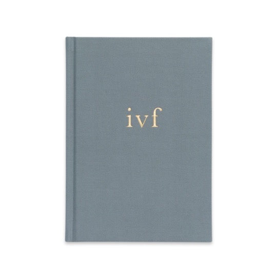 IVF Journey Journal by Write To Me with a grey linen cover and gold ivf title