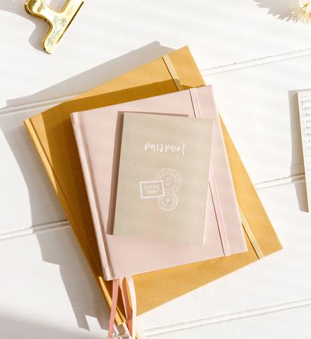 Pocket Passport expense tracker slotted into planner back pocket