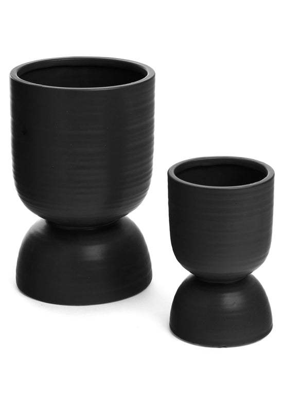 Two black Roy Planters on a white background from Bovi Home.