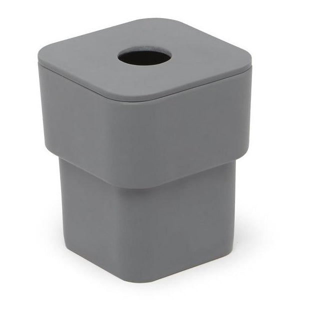 SCILLAE charcoal canister by Umbra with its lid on, on white