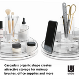 The Cascada cosmetic organizer by Umbra organic shape creates attractive spaces for makeup brushes and accessories in the Cascada makeup organizer.