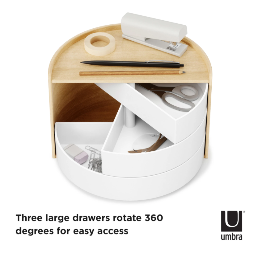 Umbra Moona storage box in white and natural with three drawers swung open, holding desk supplies