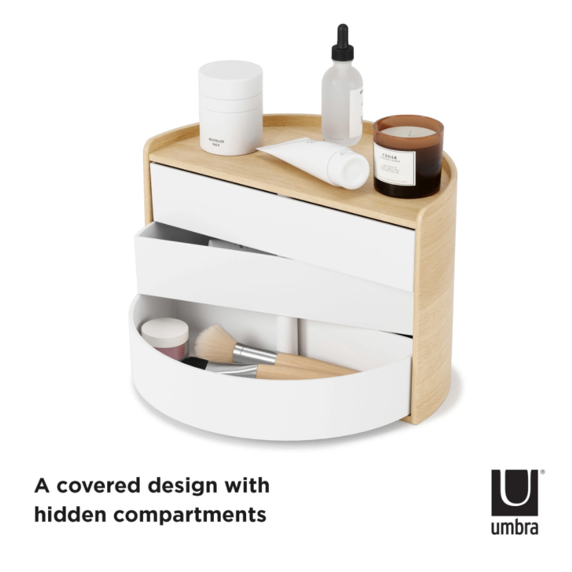 Umbra Moona storage box in white and natural with drawers rotated open, hidden compartments shown