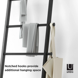The LEANA LADDER - BLACK by Umbra is an innovative storage solution that combines functionality and style. This ladder, designed by Umbra, features a sleek and modern design perfect for any space. Hang your clothes