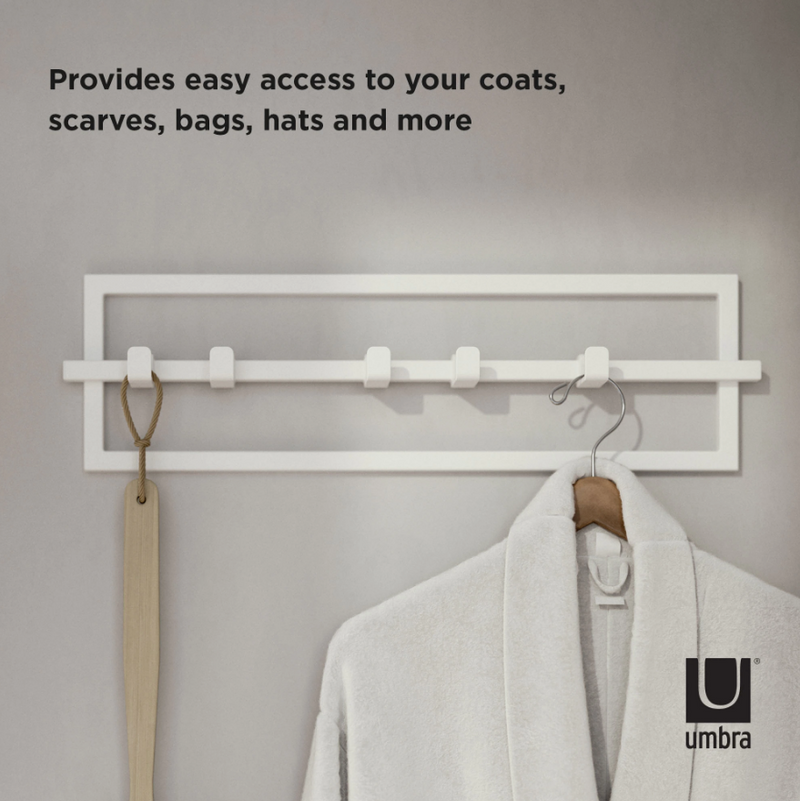 An Umbra CUBIKO 5 HOOK - White coat rack with a towel hanging on it.