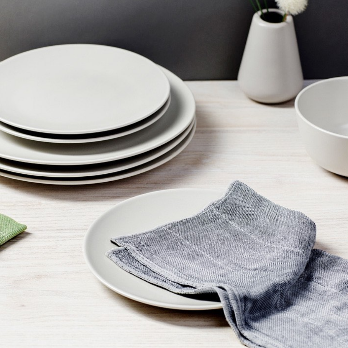Nawrap Rib Dishcloth styled beside plates and bowls