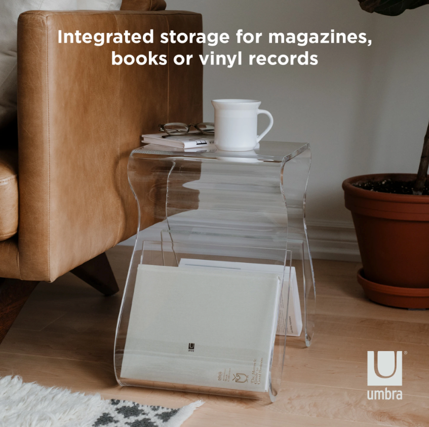 Magino stool with a book in its rack and a white mug on top, storage for books or records
