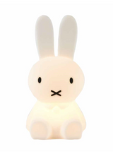 A Miffy Bundle of Light bunny, from the Mr Maria brand, sitting on a white surface.
