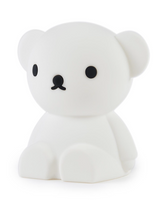 A Boris First Light Lamp by Mr Maria, a white teddy bear with an LED module, sitting on a white surface.