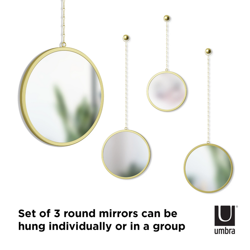Umbra's DIMA Round Mirror, Set of Three can be hung individually or in a group using the included hardware.