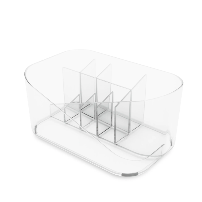 The Umbra GLAM COSMETIC ORGANIZER - Clear is a clear plastic container with multiple compartments for efficiently organizing makeup.