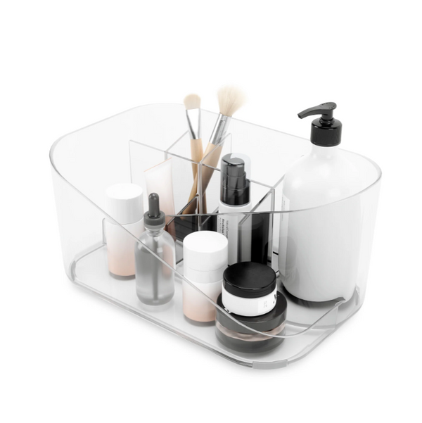 The GLAM Cosmetic Organizer by Umbra is a clear container that efficiently stores cosmetics and brushes.