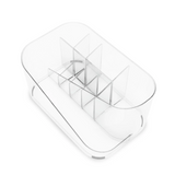 An Umbra GLAM COSMETIC ORGANIZER - Clear with several compartments.