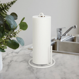 An Umbra SQUIRE COUNTERTOP PAPER TOWEL HOLDER on a counter top.