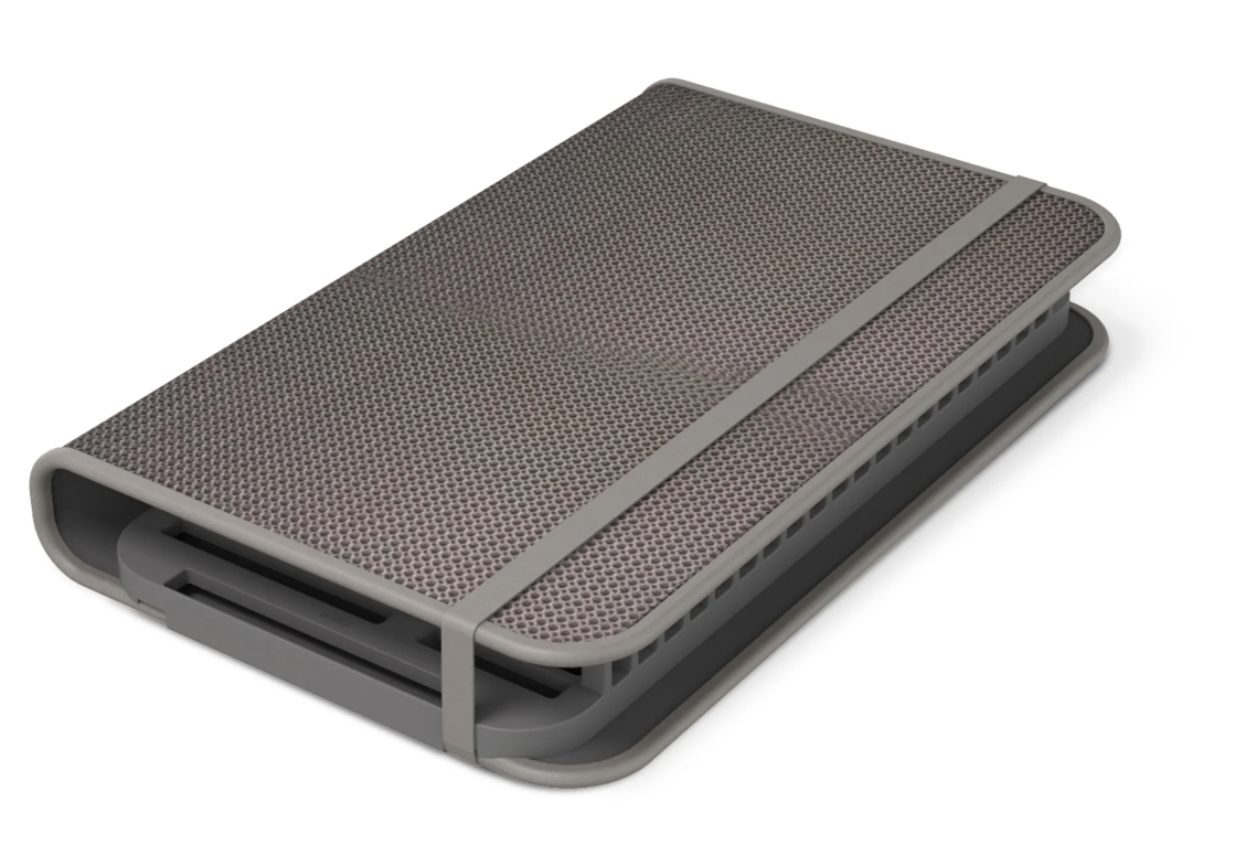 Umbra Udry drying mat rolled with the dish rack inside, banded for storage