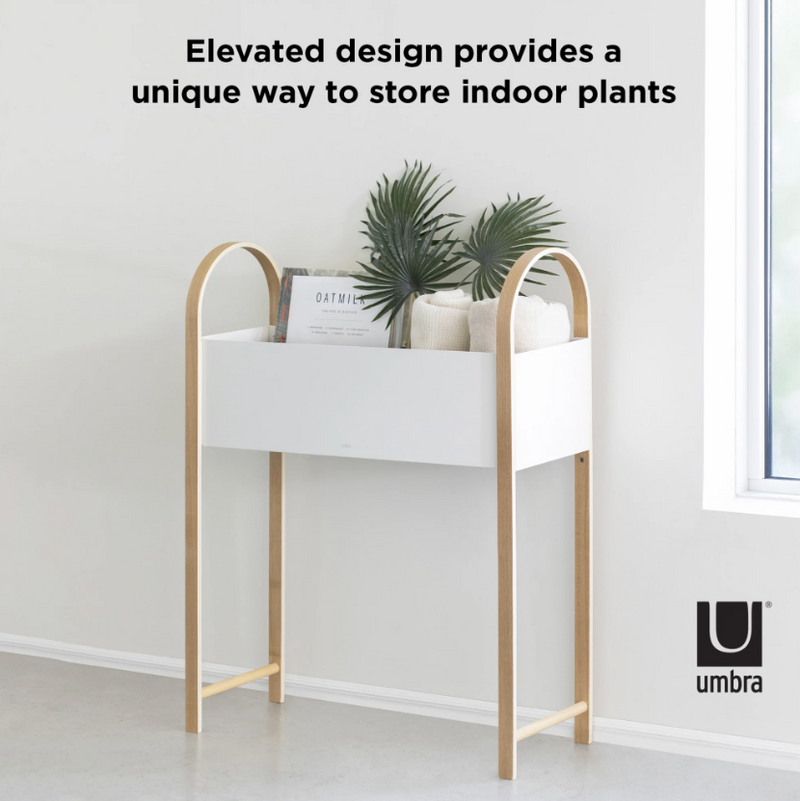Umbra's BELLWOOD STORAGE / PLANTER provides a versatile planter solution for indoor plants.