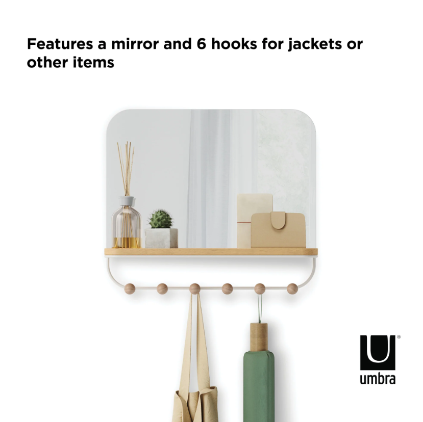 Umbra Estique mirror with a timber shelf and six hooks holding bags and an umbrella