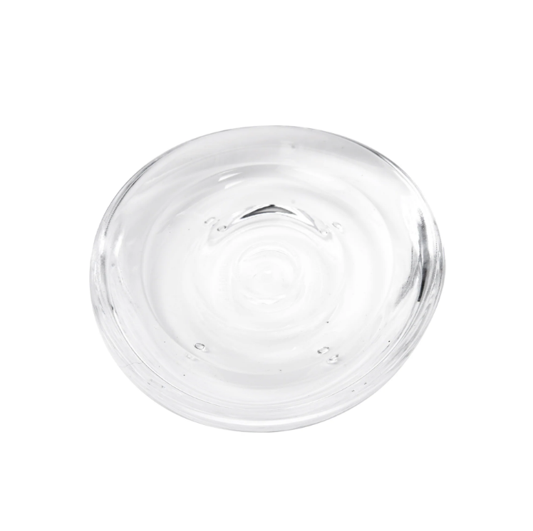 An Umbra DROPLET SOAP DISH, CLEAR.