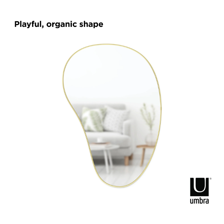 An image of a HUBBA PEBBLE MIRROR by Umbra with a playful organic shape, featuring a metallic finish.
