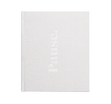 A white book with the word "panic" on it, called Press PAUSE by AXEL & ASH.
