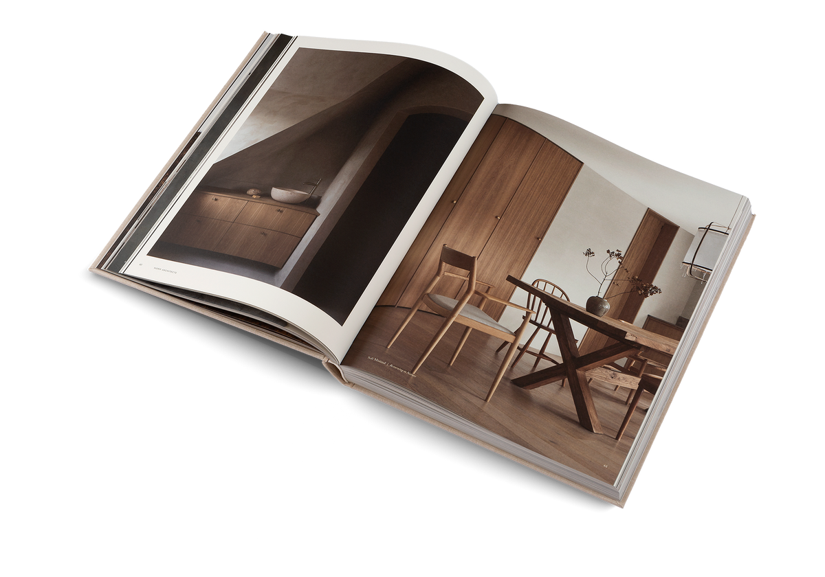 Soft Minimal open at a dark vaulted timber interior facing a timber lined dining nook