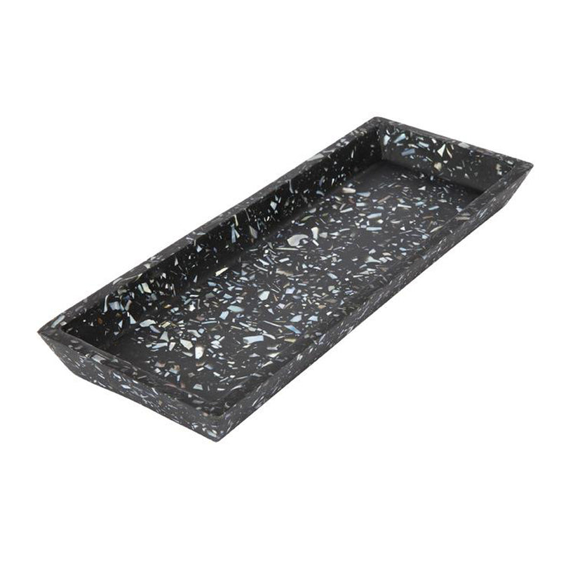 A Zakkia Terrazzo Square Tray - Black Seashell perfect for displaying candles or as a bathroom essential with black speckles.