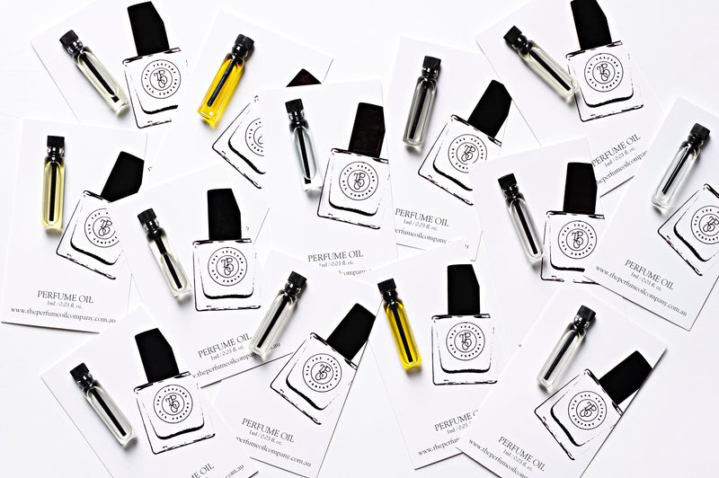A collection of business cards featuring FIVE, inspired by Number 05 (CC) perfume oils by The Perfume Oil Company.