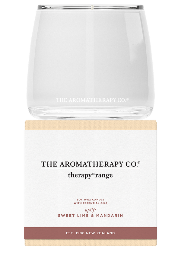 The Therapy® Candle Uplift - Sweet Lime & Mandarin by The Aromatherapy Co is a delightful blend of soy wax infused with a refreshing citrus scent.