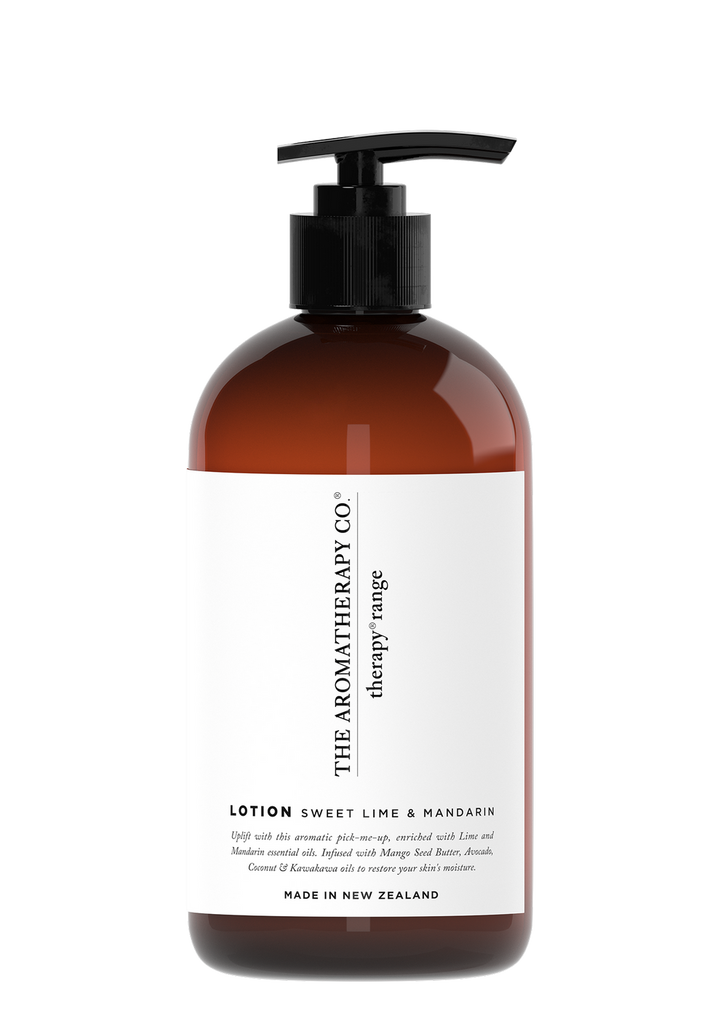 A bottle of Therapy® Hand & Body Lotion - Sweet Lime & Mandarin by The Aromatherapy Co with a white bottle on a black background, infused with the uplifting aromas of Lime and Mandarin essential oils.