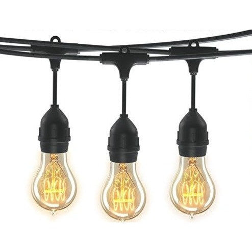 Festoon lights strung along an outdoor deck creating warm evening ambience