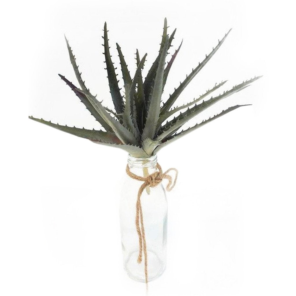 Artificial aloe vera plant in a decorative pot