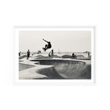 A black and white photo of a skateboarder in Oceanfront Park by Art Prints available for delivery.